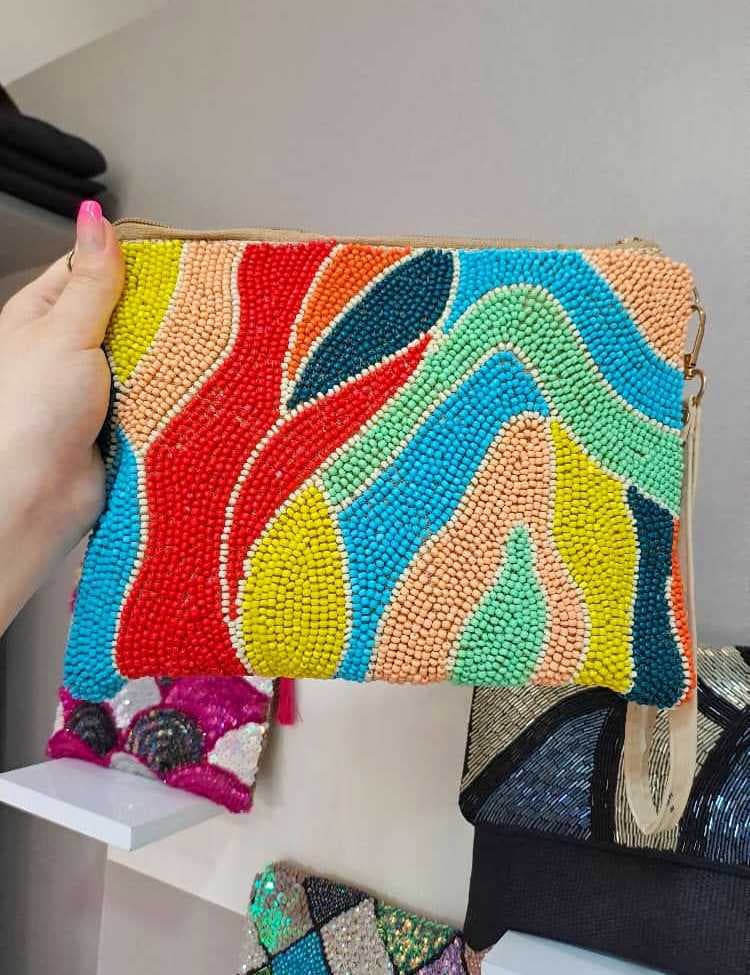 a-unique-handbag-adorned-with-handcrafted-beads-in-vibrant-colors