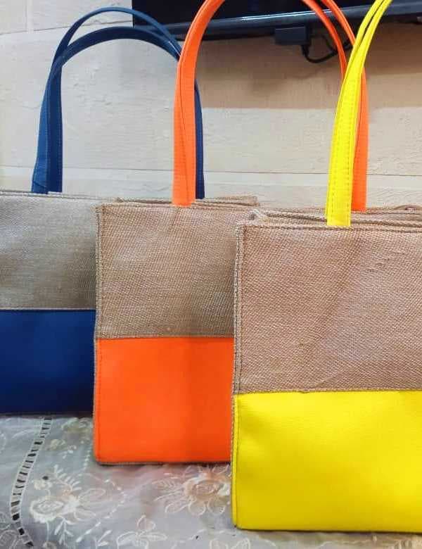 A stylish handbag made from natural jute fabric Blue