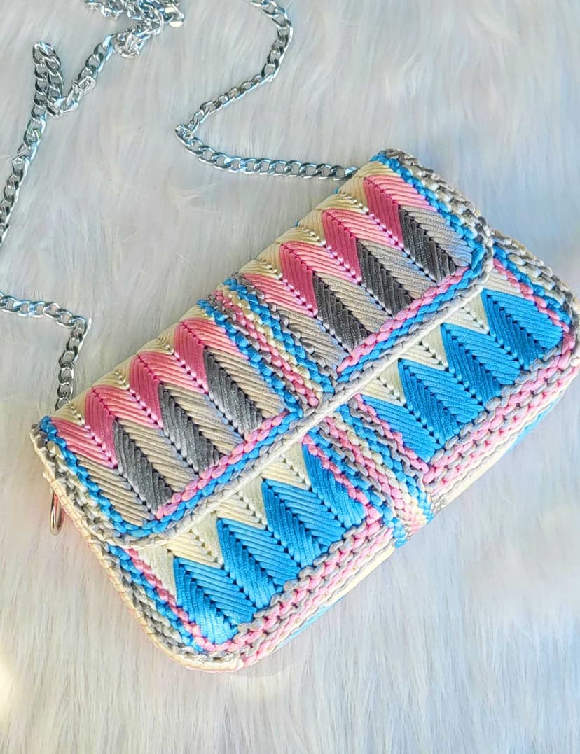 a stylish small bag made from colorful satin light Blue