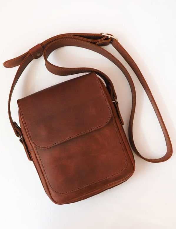 A classic brown genuine leather shoulder bag