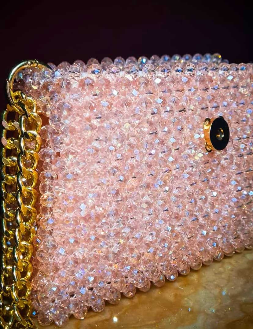 A chic, handcrafted handbag made of sparkling Glass Crystal beads Pink