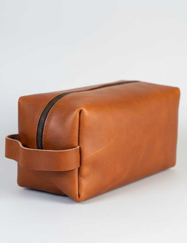 A minimalist genuine leather toiletry bag Light brown