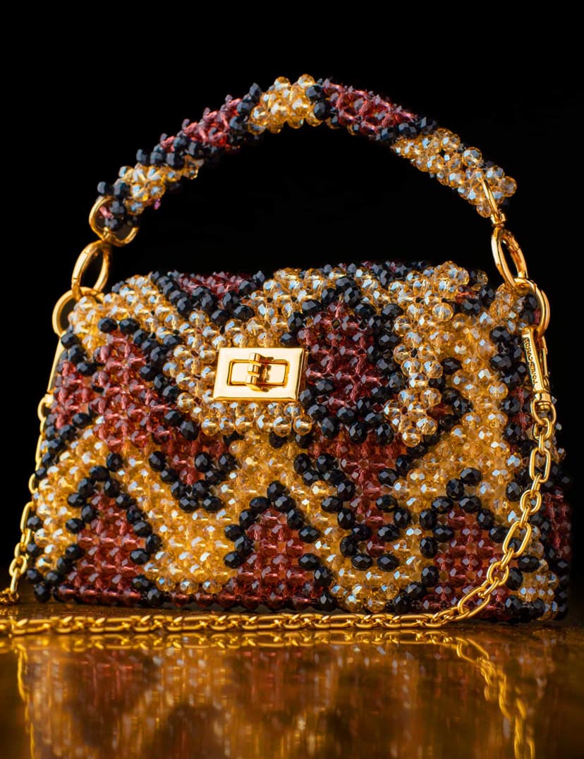 luxurious handbag is entirely handcrafted - 2