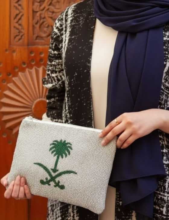 The clutch features a palm tree design White - 2